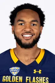 Headshot of a Kent State football player wearing a navy blue jersey with 'Golden Flashes' text in gold letters