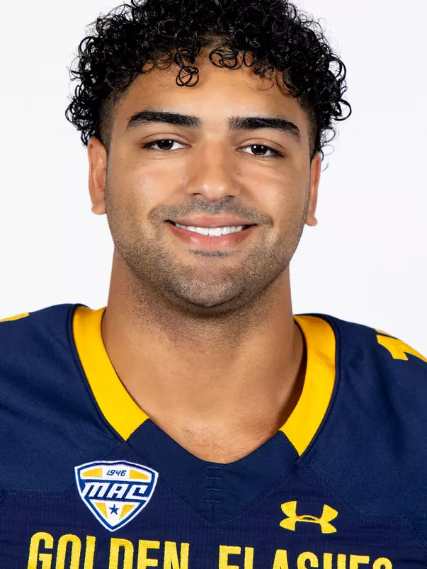 Headshot of a Kent State football player wearing a navy blue jersey with 'Golden Flashes' text in gold letters