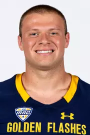 Headshot of a Kent State football player wearing a navy blue jersey with 'Golden Flashes' text in gold letters