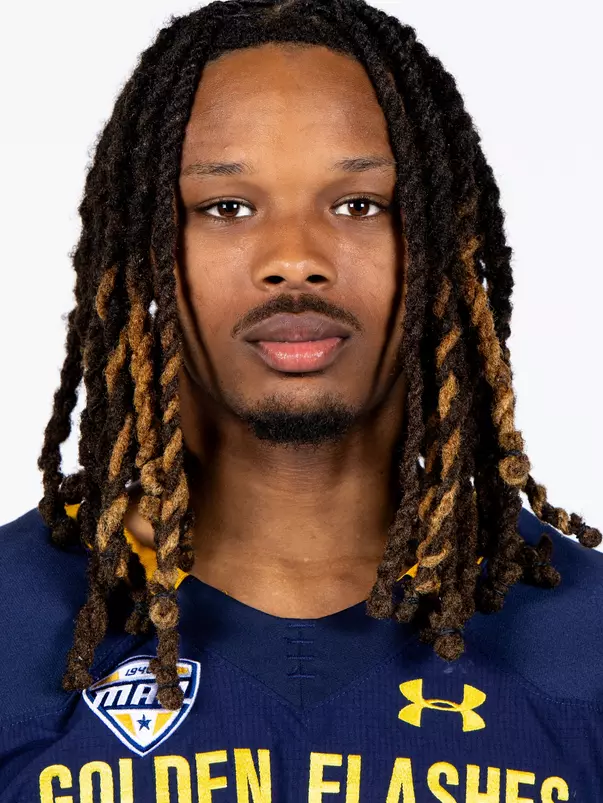 Headshot of a Kent State football player wearing a navy blue jersey with 'Golden Flashes' text in gold letters