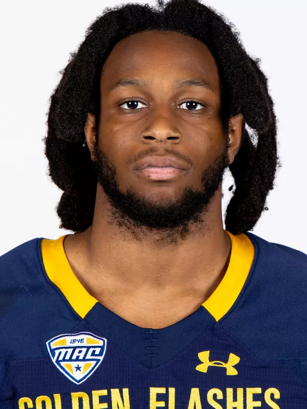 Headshot of a Kent State football player wearing a navy blue jersey with 'Golden Flashes' text in gold letters