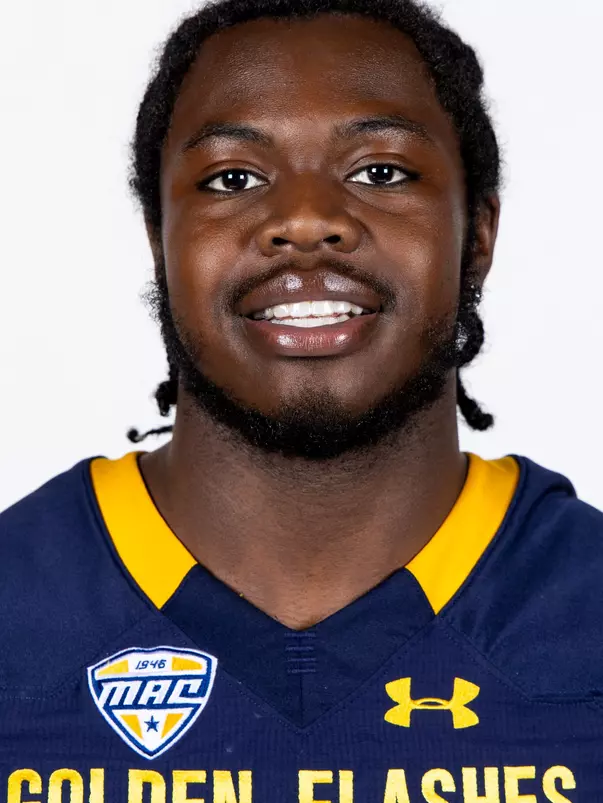 Headshot of a Kent State football player wearing a navy blue jersey with 'Golden Flashes' text in gold letters