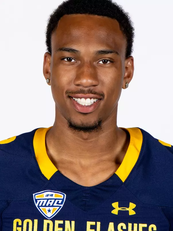 Headshot of a Kent State football player wearing a navy blue jersey with 'Golden Flashes' text in gold letters