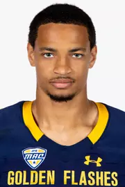 Headshot of a Kent State football player wearing a navy blue jersey with 'Golden Flashes' text in gold letters