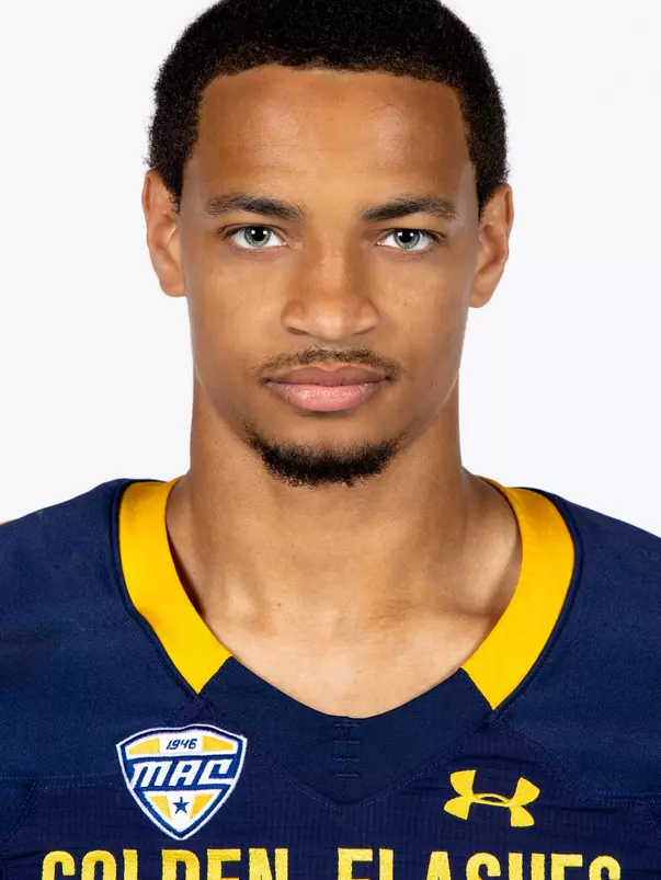 Headshot of a Kent State football player wearing a navy blue jersey with 'Golden Flashes' text in gold letters