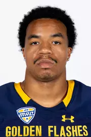Headshot of a Kent State football player wearing a navy blue jersey with 'Golden Flashes' text in gold letters