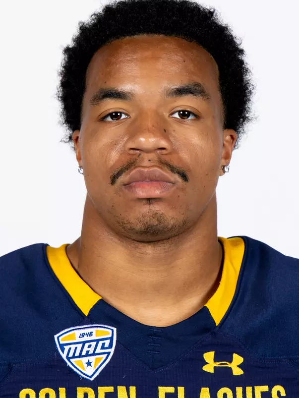 Headshot of a Kent State football player wearing a navy blue jersey with 'Golden Flashes' text in gold letters