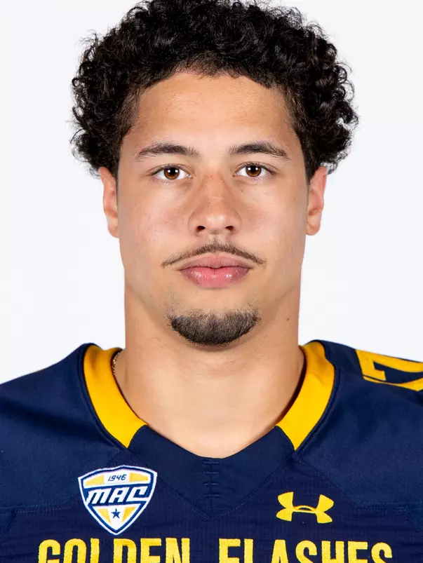 Headshot of a Kent State football player wearing a navy blue jersey with 'Golden Flashes' text in gold letters