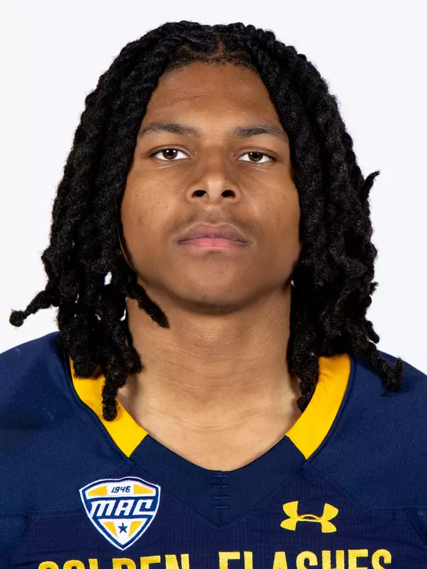 Headshot of a Kent State football player wearing a navy blue jersey with 'Golden Flashes' text in gold letters