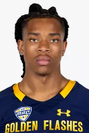 Headshot of a Kent State football player wearing a navy blue jersey with 'Golden Flashes' text in gold letters