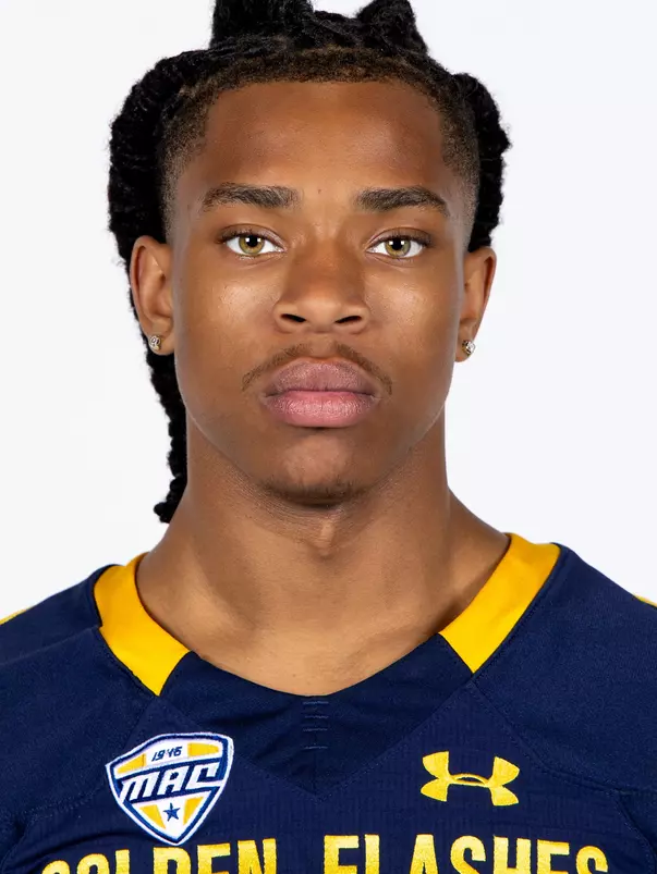 Headshot of a Kent State football player wearing a navy blue jersey with 'Golden Flashes' text in gold letters