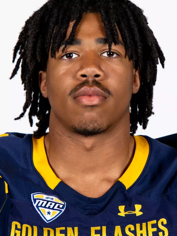 Headshot of a Kent State football player wearing a navy blue jersey with 'Golden Flashes' text in gold letters