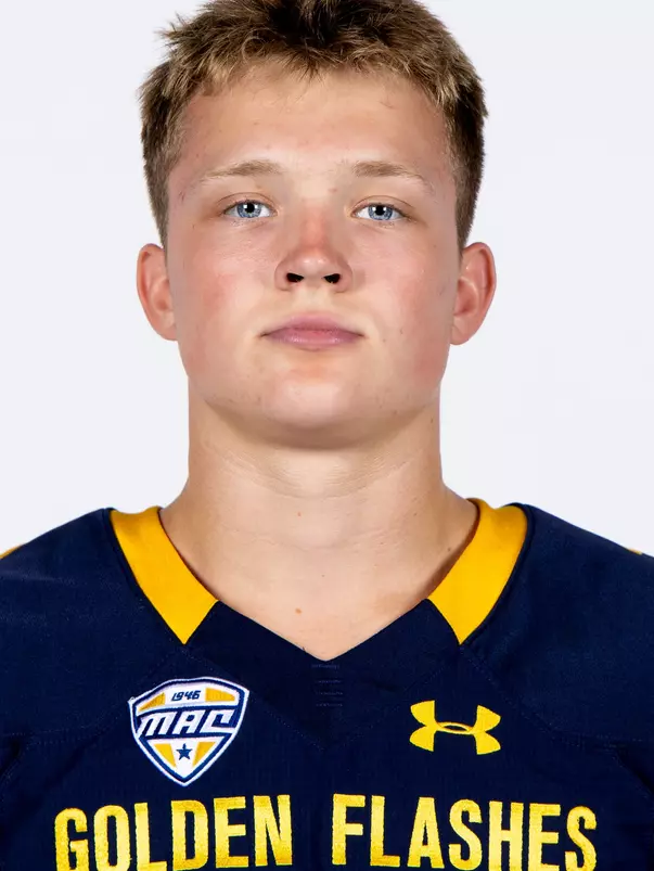 Headshot of a Kent State football player wearing a navy blue jersey with 'Golden Flashes' text in gold letters