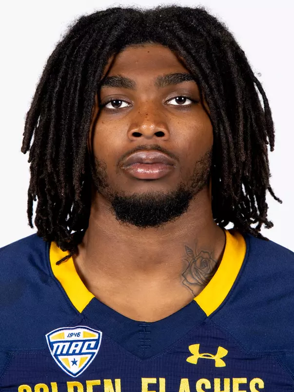 Headshot of a Kent State football player wearing a navy blue jersey with 'Golden Flashes' text in gold letters