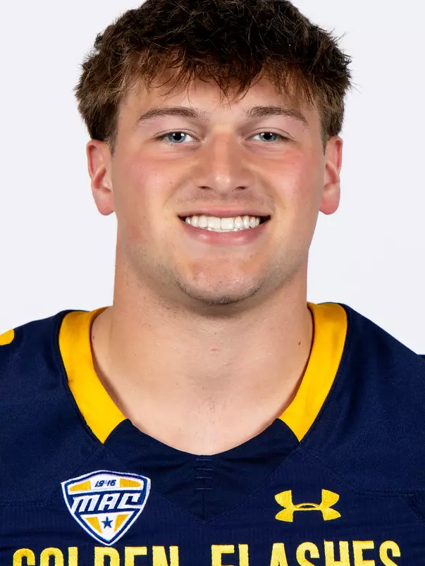 Headshot of a Kent State football player wearing a navy blue jersey with 'Golden Flashes' text in gold letters