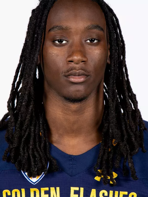 Headshot of a Kent State football player wearing a navy blue jersey with 'Golden Flashes' text in gold letters