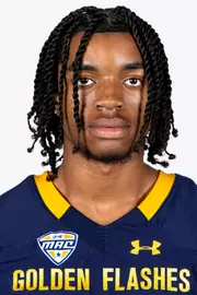 Headshot of a Kent State football player wearing a navy blue jersey with 'Golden Flashes' text in gold letters