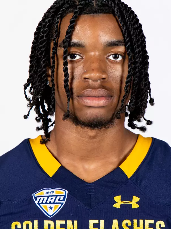 Headshot of a Kent State football player wearing a navy blue jersey with 'Golden Flashes' text in gold letters