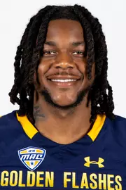 Headshot of a Kent State football player wearing a navy blue jersey with 'Golden Flashes' text in gold letters