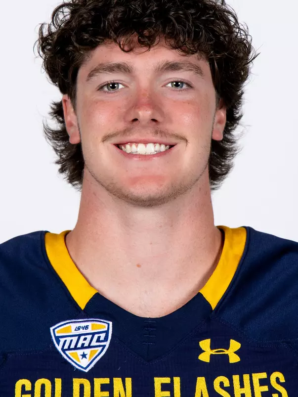 Headshot of a Kent State football player wearing a navy blue jersey with 'Golden Flashes' text in gold letters