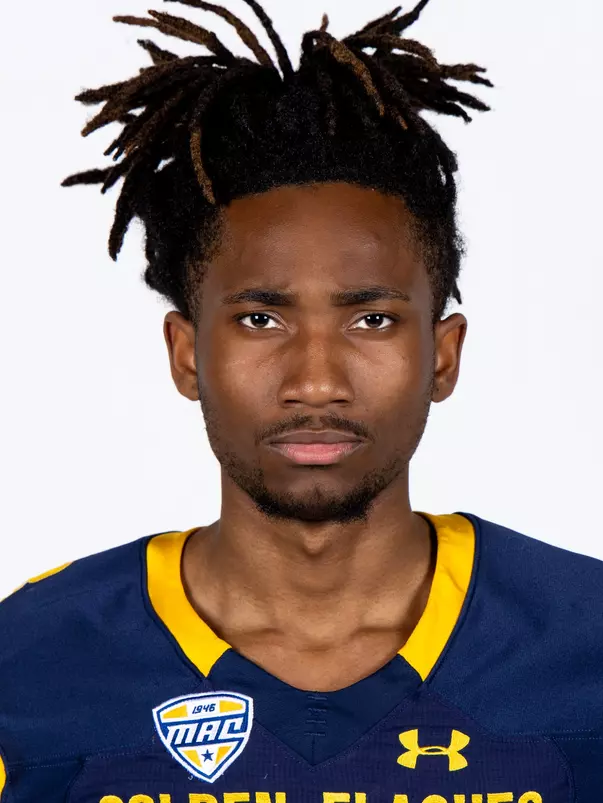Headshot of a Kent State football player wearing a navy blue jersey with 'Golden Flashes' text in gold letters