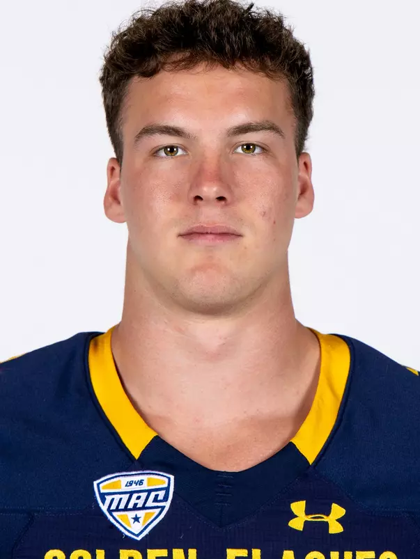 Headshot of a Kent State football player wearing a navy blue jersey with 'Golden Flashes' text in gold letters