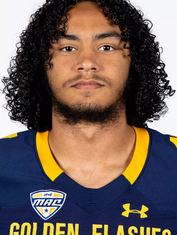 Headshot of a Kent State football player wearing a navy blue jersey with 'Golden Flashes' text in gold letters