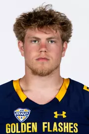 Headshot of a Kent State football player wearing a navy blue jersey with 'Golden Flashes' text in gold letters