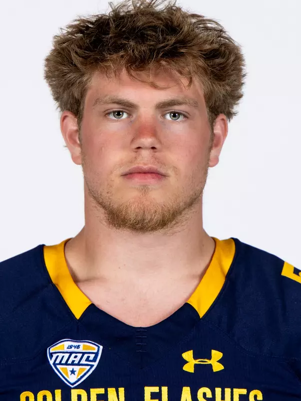 Headshot of a Kent State football player wearing a navy blue jersey with 'Golden Flashes' text in gold letters