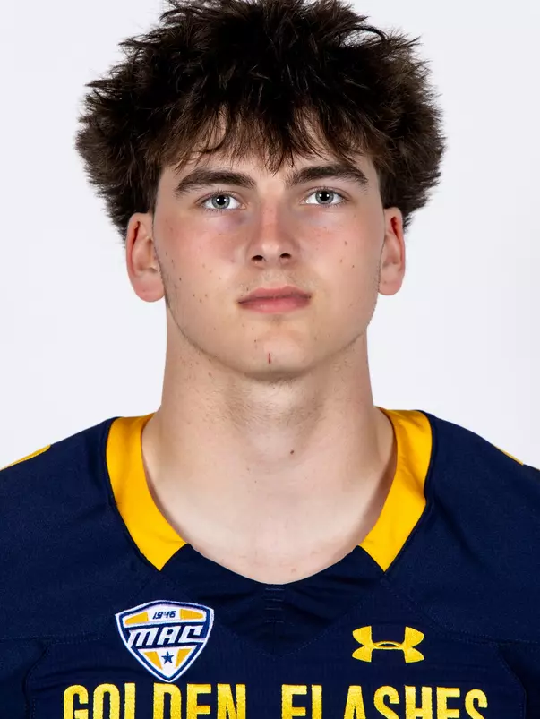 Headshot of a Kent State football player wearing a navy blue jersey with 'Golden Flashes' text in gold letters