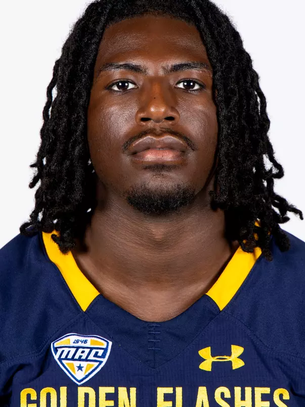 Headshot of a Kent State football player wearing a navy blue jersey with 'Golden Flashes' text in gold letters