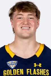 Headshot of a Kent State football player wearing a navy blue jersey with 'Golden Flashes' text in gold letters