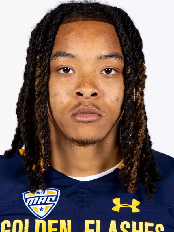 Headshot of a Kent State football player wearing a navy blue jersey with 'Golden Flashes' text in gold letters
