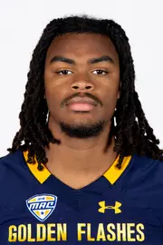 Headshot of a Kent State football player wearing a navy blue jersey with 'Golden Flashes' text in gold letters