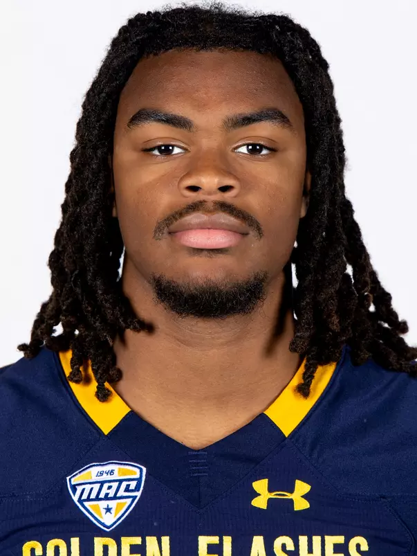 Headshot of a Kent State football player wearing a navy blue jersey with 'Golden Flashes' text in gold letters
