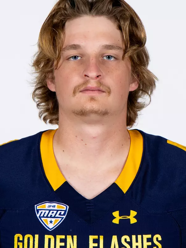 Headshot of a Kent State football player wearing a navy blue jersey with 'Golden Flashes' text in gold letters