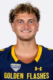 Headshot of a Kent State football player wearing a navy blue jersey with 'Golden Flashes' text in gold letters