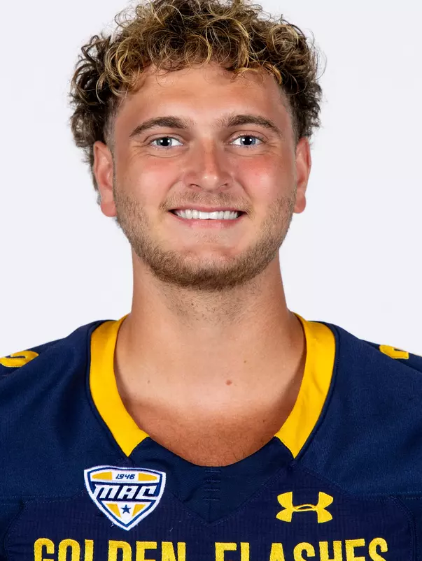 Headshot of a Kent State football player wearing a navy blue jersey with 'Golden Flashes' text in gold letters