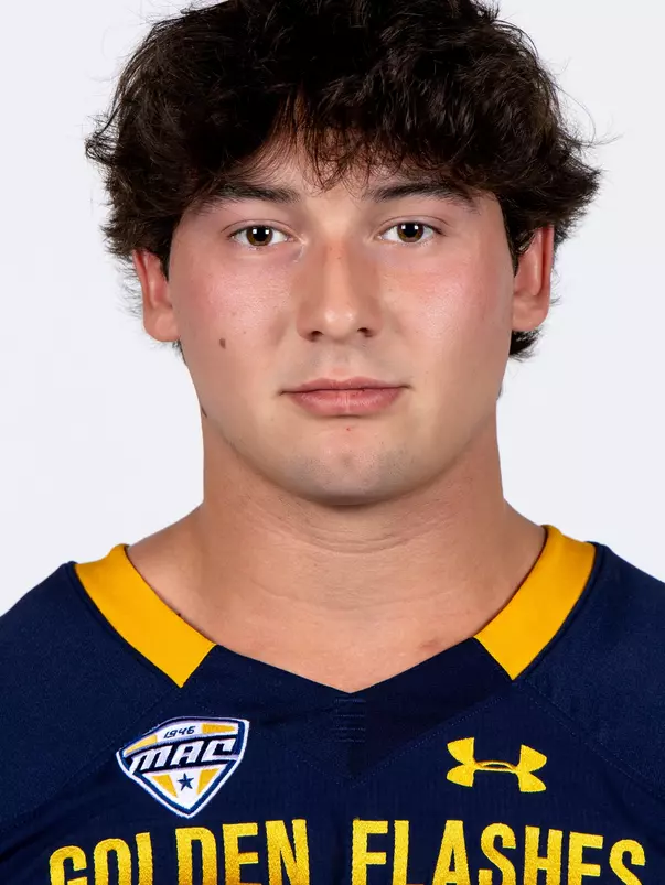 Headshot of a Kent State football player wearing a navy blue jersey with 'Golden Flashes' text in gold letters