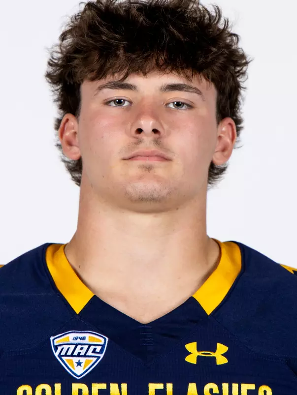 Headshot of a Kent State football player wearing a navy blue jersey with 'Golden Flashes' text in gold letters