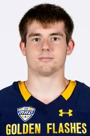 Headshot of a Kent State football player wearing a navy blue jersey with 'Golden Flashes' text in gold letters