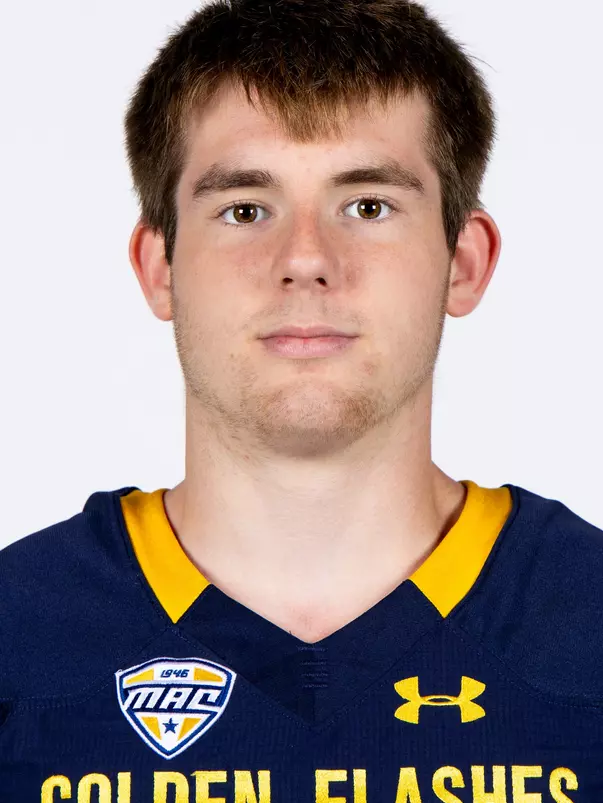 Headshot of a Kent State football player wearing a navy blue jersey with 'Golden Flashes' text in gold letters