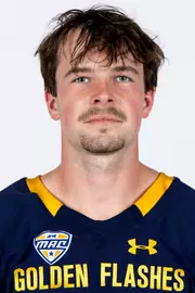 Headshot of a Kent State football player wearing a navy blue jersey with 'Golden Flashes' text in gold letters
