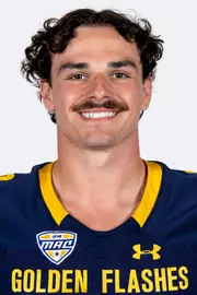 Headshot of a Kent State football player wearing a navy blue jersey with 'Golden Flashes' text in gold letters