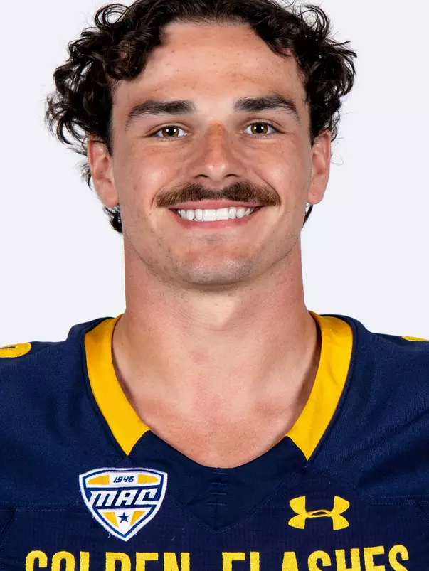 Headshot of a Kent State football player wearing a navy blue jersey with 'Golden Flashes' text in gold letters