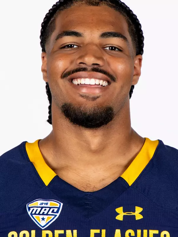 Headshot of a Kent State football player wearing a navy blue jersey with 'Golden Flashes' text in gold letters