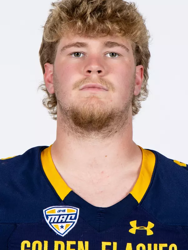 Headshot of a Kent State football player wearing a navy blue jersey with 'Golden Flashes' text in gold letters