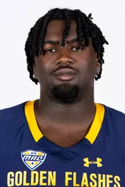 Headshot of a Kent State football player wearing a navy blue jersey with 'Golden Flashes' text in gold letters