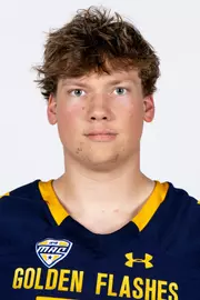 Headshot of a Kent State football player wearing a navy blue jersey with 'Golden Flashes' text in gold letters