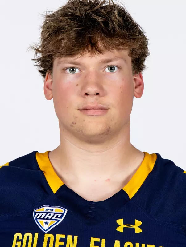 Headshot of a Kent State football player wearing a navy blue jersey with 'Golden Flashes' text in gold letters
